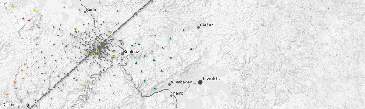 Map of the Eifel region in western Germany, shown in shades of grey. Several cities are marked: Cologne and Maastricht in the north, Frankfurt in the east, and Koblenz in the south. Many small triangles show where the measuring stations were located. Many were aligned along a chain from north-east to south-west and in the centre around Lake Laach.