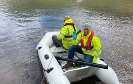 Anke Neumann aon a boat during a research trip