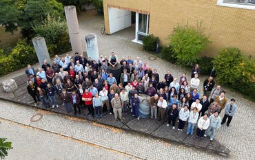 Drone Picture of a big group of people standing in front of GFZ House H.