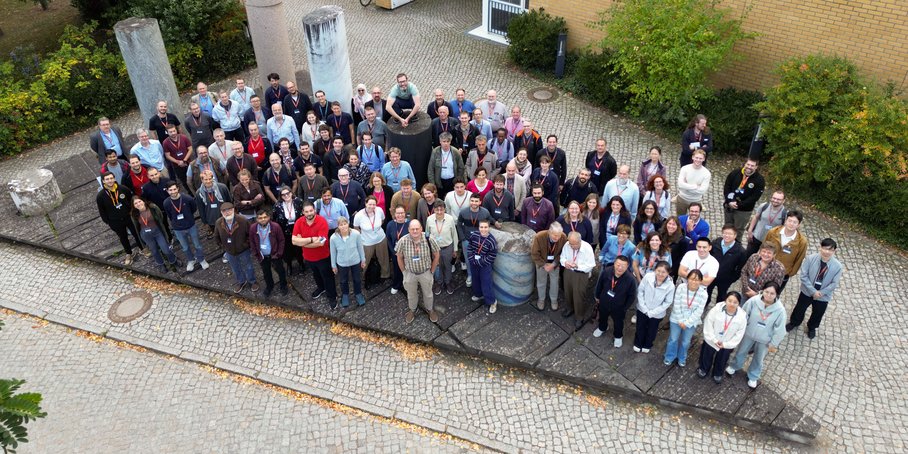 Drone Picture of a big group of people standing in front of GFZ House H.