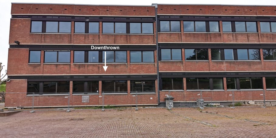 three story building made of brick