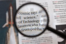 magnifying glass on text