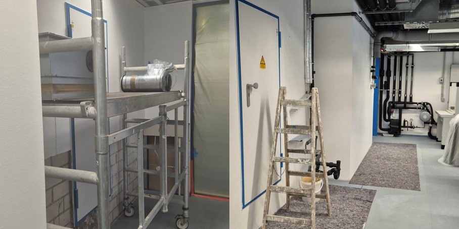 Bild 4: Austausch der Brandschutzklappen / Neu verputzte und gemalerte Wände, vom ursprünglichen Schaden ist nichts mehr zu sehen