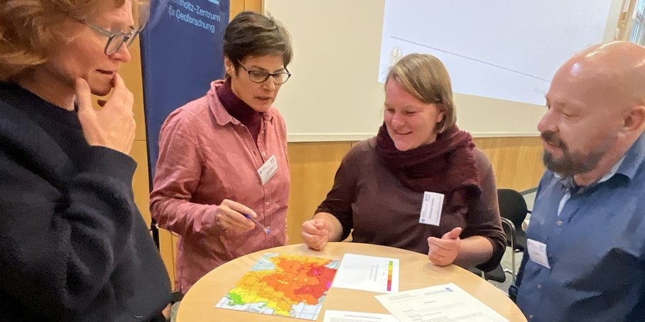 Workshop photo with four participants.