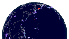 Globe with outlines of the continents and coloured dots for earthquake visualisation
